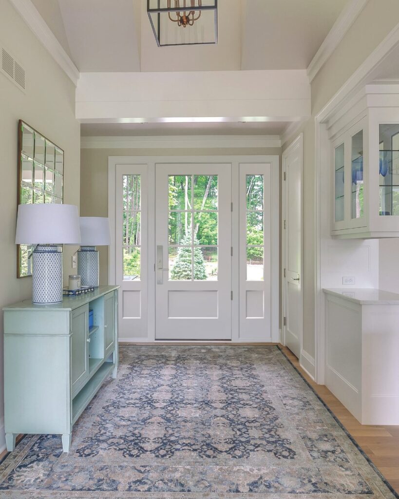 Contemporary fiberglass entry door with two recessed shaker panels in crisp white