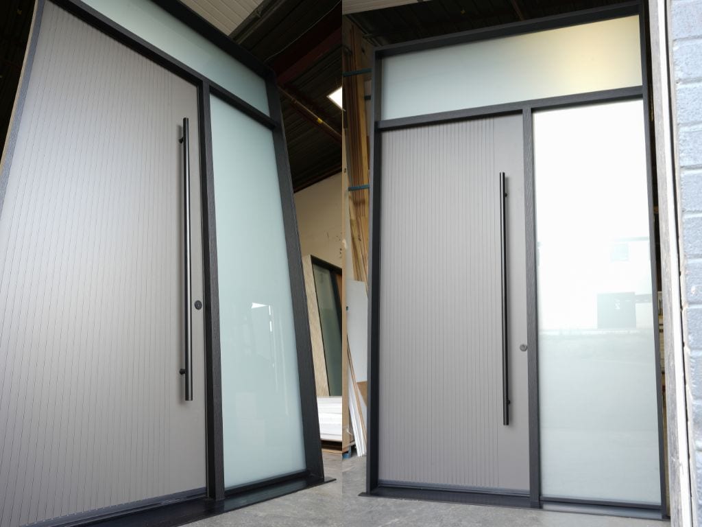 Modern exterior sliding door with frosted glass and black frame.