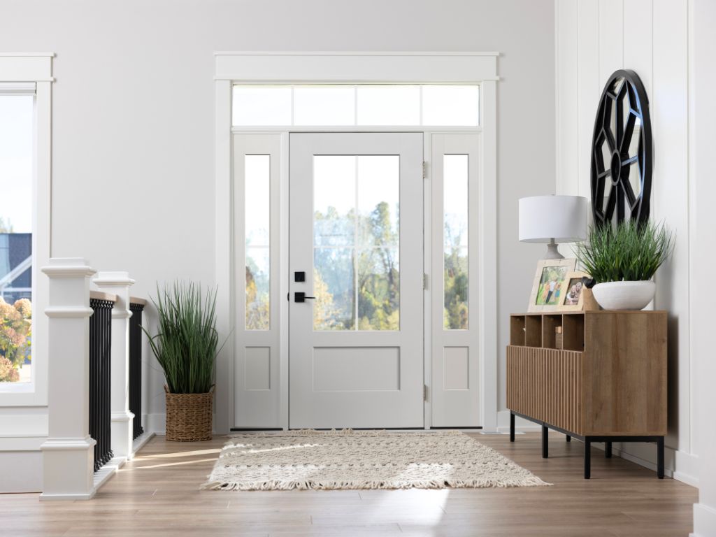 Modern white exterior and interior door with glass panels, ideal for home entryways.