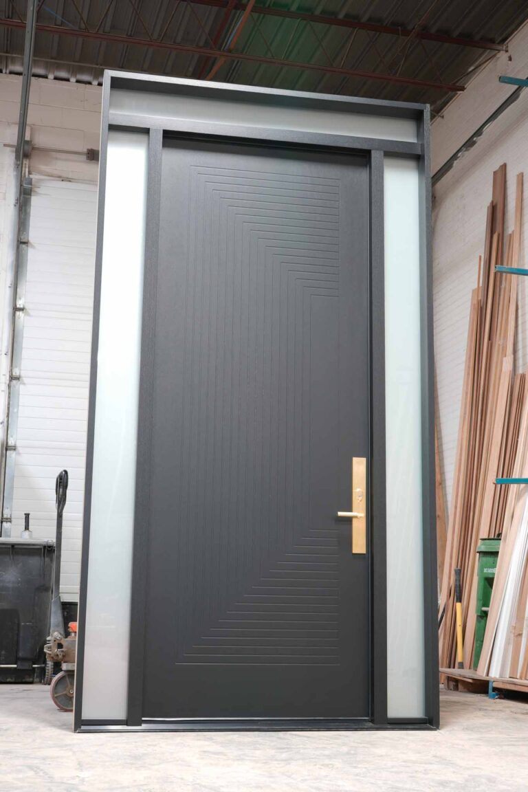 Black fiberglass exterior door with minimalist design and modern handle set